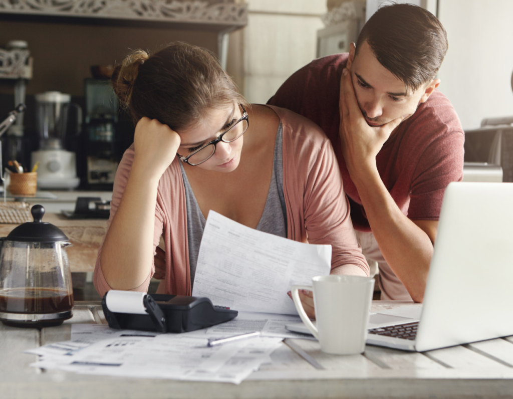A couple looking for business debt settlement service