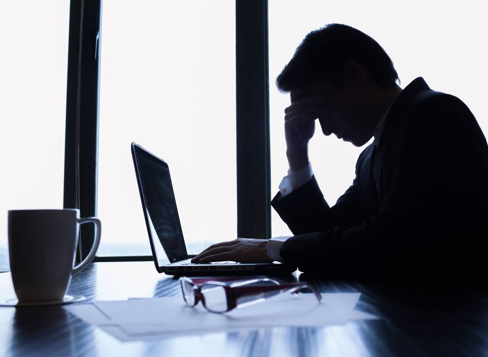 A business owner wondering if debt restructuring is a good idea for his company’s future.