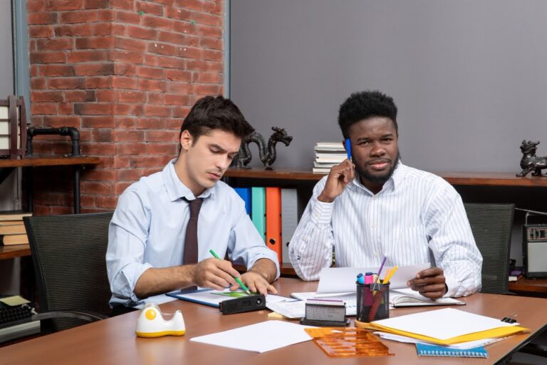 A bookkeeper and CPA at a meeting to discuss accounting and tax planning.