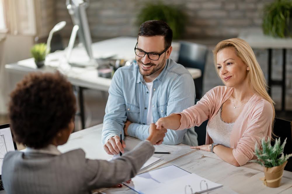 Small business owners negotiating with a creditor.