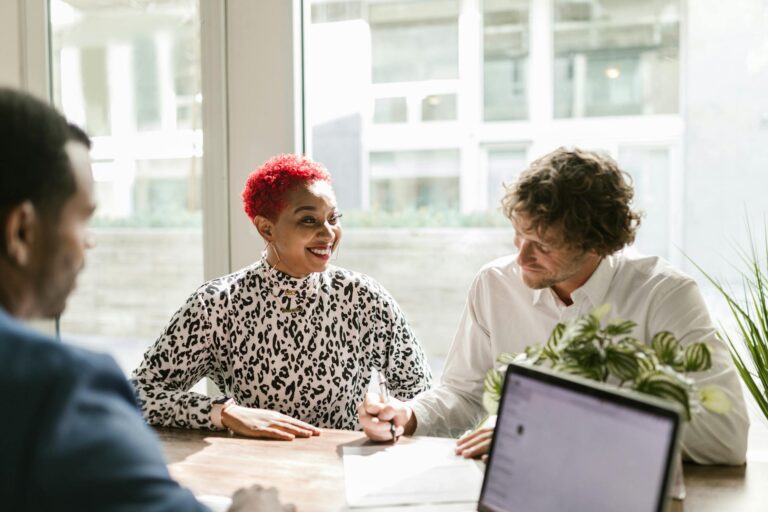 Group of people working on a debt settlement.