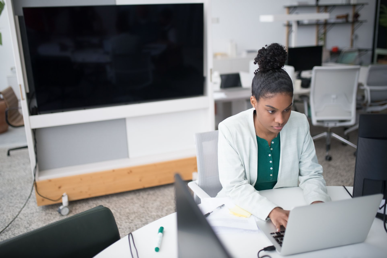 A businesswoman evaluating her bookkeeper.