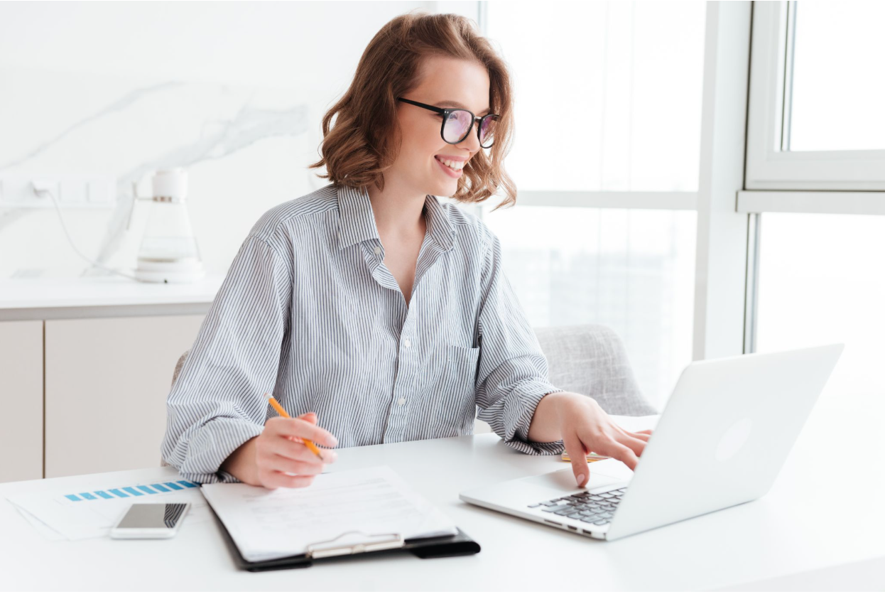 Woman keeping track of her financial statements on a laptop.